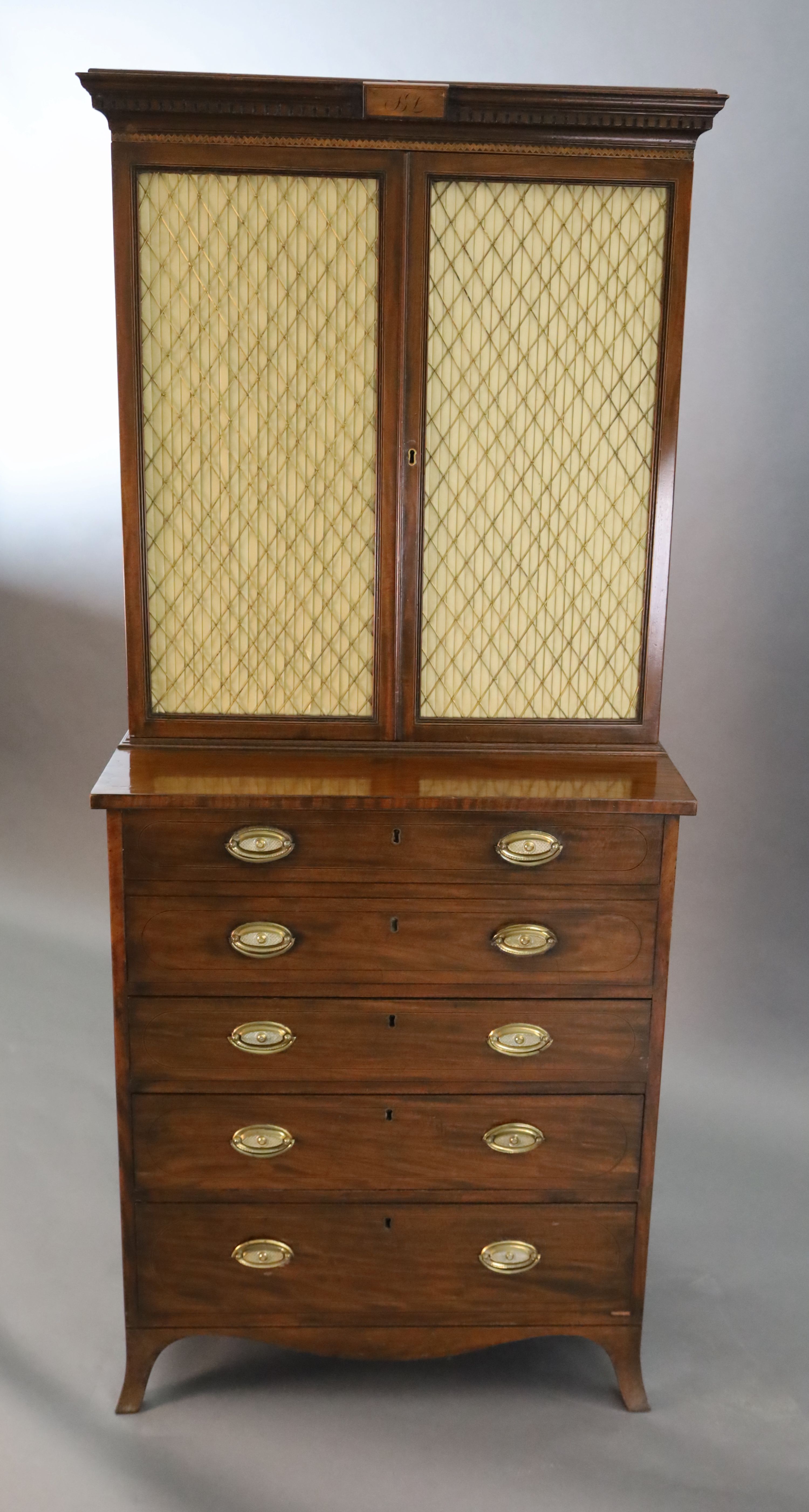 A Regency mahogany secretaire bookcase, W.2ft 9in. D.1ft 8in. H.6ft 1in.